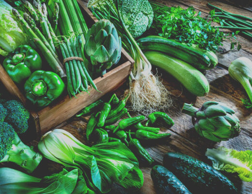 winter vegetables in basket on a wood table