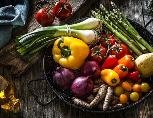 summer vegetables in bowl on a wood table